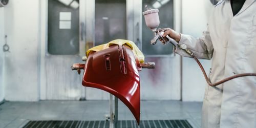 Tesla bumper paint repair in Dubai